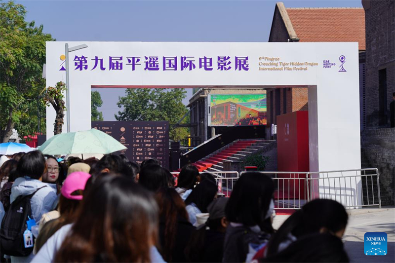 Επισκ?πτε? στο 9ο Διεθν?? Φεστιβ?λ Κινηματογρ?φου Πινγκγι?ο στην αρχα?α π?λη Πινγκγι?ο τη? επαρχ?α? Σανσ?, στι? 24 Σεπτεμβρ?ου του 2025. (Φωτογραφ?α / Xinhua)